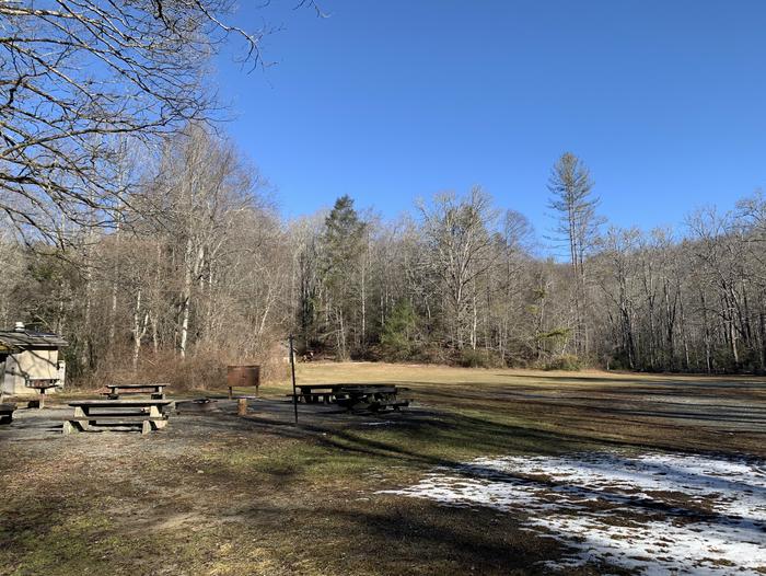 Upper Cove Creek is the more secluded of the two campsites and requires two short vehicle creek crossings.This site includes a picnic area, oversized fire ring, potable water, and vault toilets. Vault toilets are located opposite of the parking area.