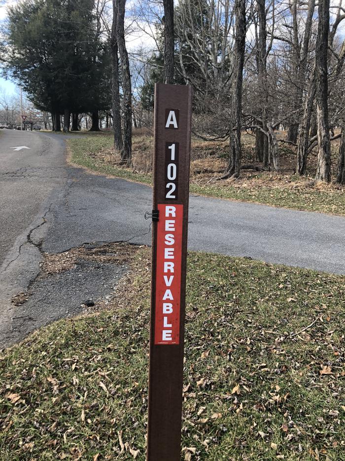 Site marker for A102; If you reserve this site, your camping pass will be attached to this site marker.  When you check out, drop your pass off at the registration office. 