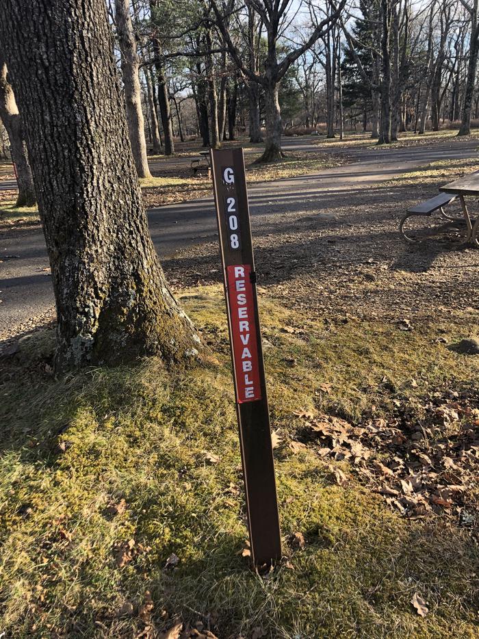 Site marker for G208; If you reserve this site, your camping pass will be attached to this maker.  When you check out drop your camping pass at the registration office.