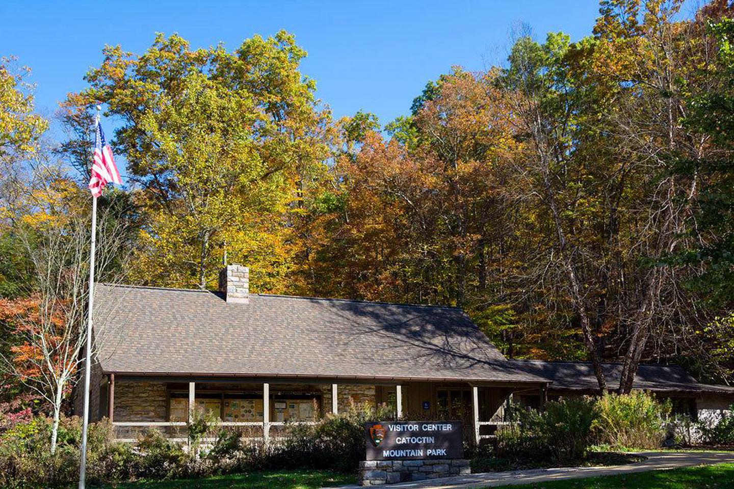 Visitor Center in FallDuring fall, the pollinator garden dies off and the surrounding trees turn every shade of yellow, orange, and red.