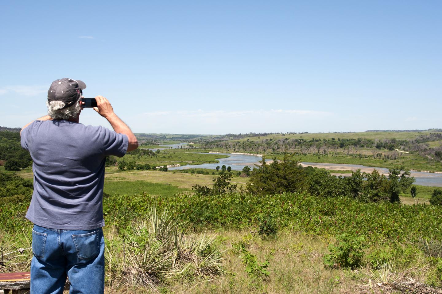 Taking photos along the Niobrara NSRParts of the river are shallow and meandering, making beautiful backdrops for people to take photographs.