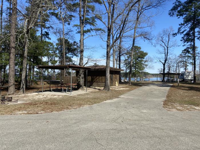 Campsite With Water, Electric, Covered Picnic Table and Shelter Structure