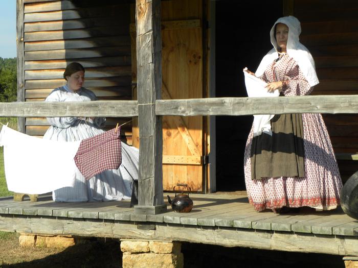 Edwards CabinLiving history volunteers give demonstration at the historic Edwards Cabin