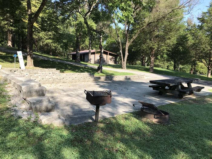WILLOW GROVE CAMPGROUND SITE # 7 ADA GRILLS IN FOREGROUND; SHOWER HOUSE IN BACKGROUNDWILLOW GROVE CAMPGROUND SITE # 7 ADA 