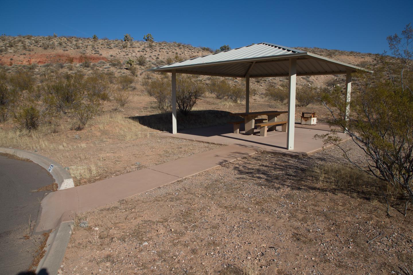 Site 97 WalkwaySite 97 has paved walkway, shelter, and fire pit