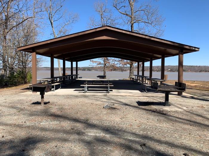 Buffalo Park Day Use Area Picnic ShelterWelcome to Buffalo Park Day Use Picnic Shelter! Here is a great picture of what the shelter looks like. It is roughly about 20-30 feet long with multiple picnic tables and grills. 