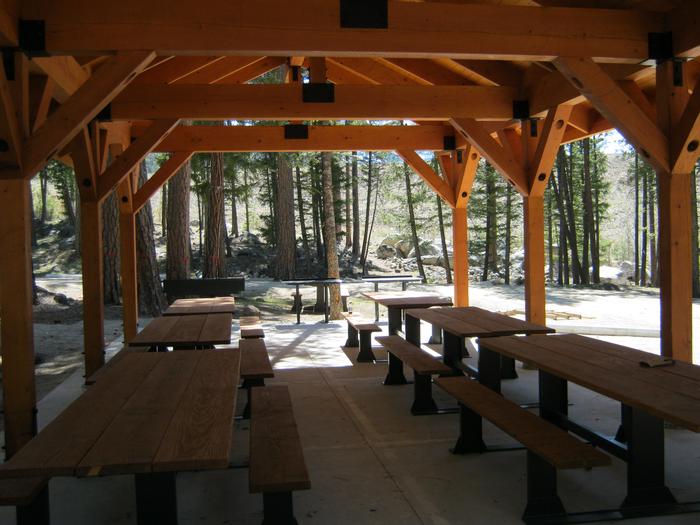 Inside of group shelter, with picnic tablesthree sisters group site