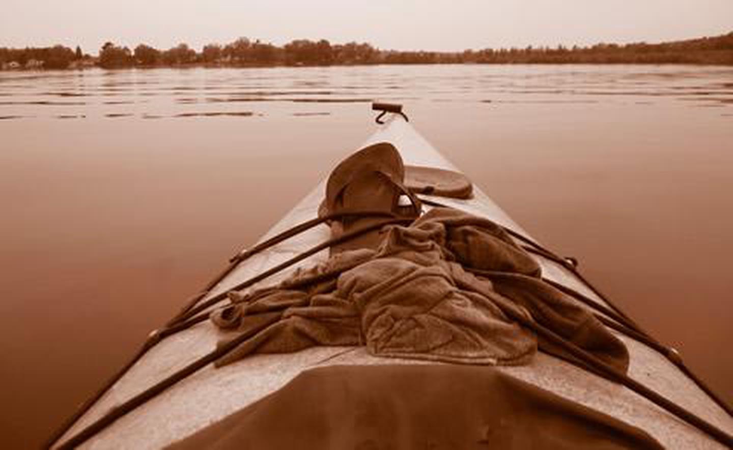 Sepia kayak on the lakeKayaking on a still lake
