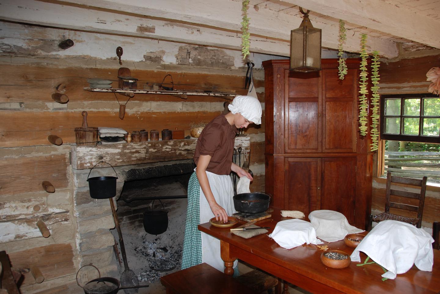 Cabin at Living Historical FarmPark rangers depict pioneer life in the 1820s.