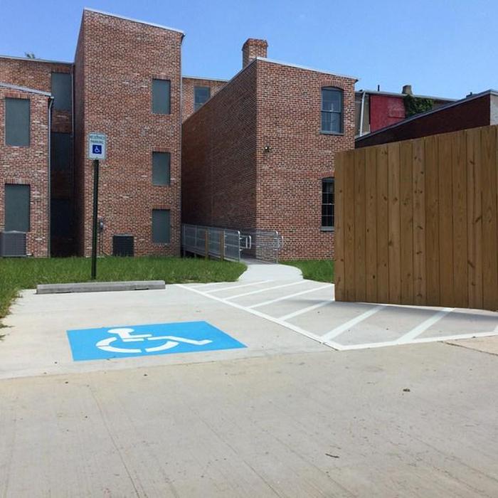Handicapped Accessibility at the back of the Carter G. Woodson Home NHSHandicapped Accessibility (ramp, parking space) at the back of the Carter G. Woodson Home NHS.