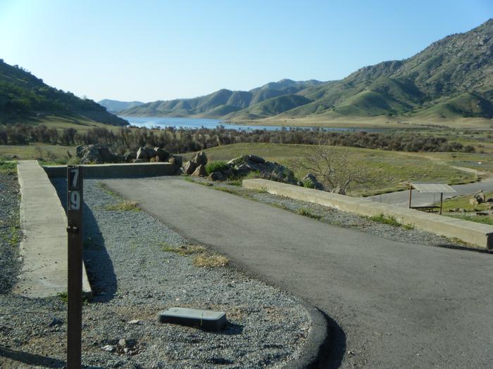 Long driveway for open enclosed campsite. There is no shade on the site. Great seasonal view of Lake Kaweah. Popular for night sky viewing.Long driveway for multipurpose campsite. From tent to RV can be accommodated. Most long camping units pull in instead of backing in since the one way road is on a slope. 