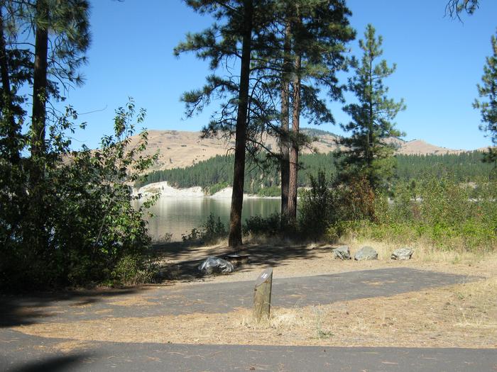 Site 16. Back in with trees and lake in the background.