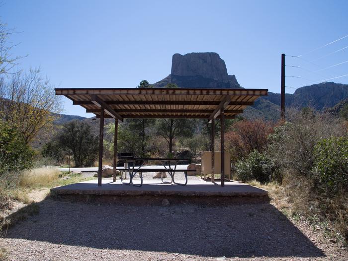 Rocky, sloped site with shade shelter and Casa Grande Mountain view