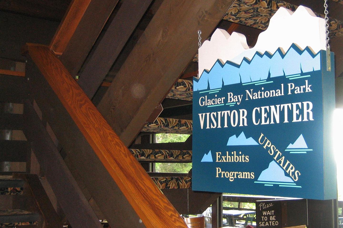Glacier Bay Lodge Upstairs Visitor Center SignHead upstairs after you enter the Glacier Bay Lodge to find the Visitor Center.