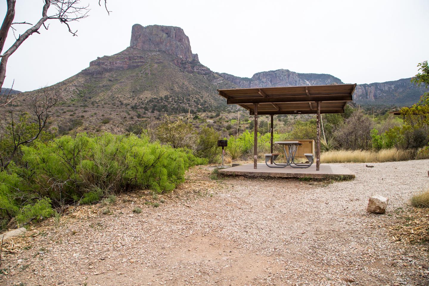 Shade shelter in site with view of Casa Grande in background