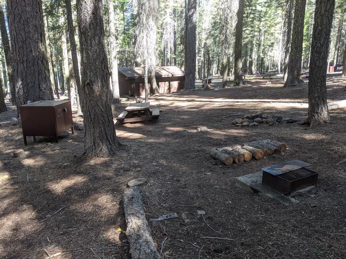 Running Deer #7 Photo 2Site #7 with bear box, picnic table, grill, and fire ring in view. Restroom is nearby