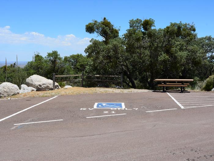RV site 21 is an accessible campsite and has an accessible picnic table just to the right side of the parking space.RV site 21 is an accessible campsite.