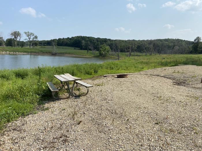 A photo of Site PA03 of Loop PENA at ROCK CREEK (KS) with Picnic Table, Waterfront