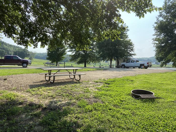 A photo of Site PB56 of Loop PENB at ROCK CREEK (KS) with Picnic Table, Electricity Hookup, Fire Pit, Water Hookup