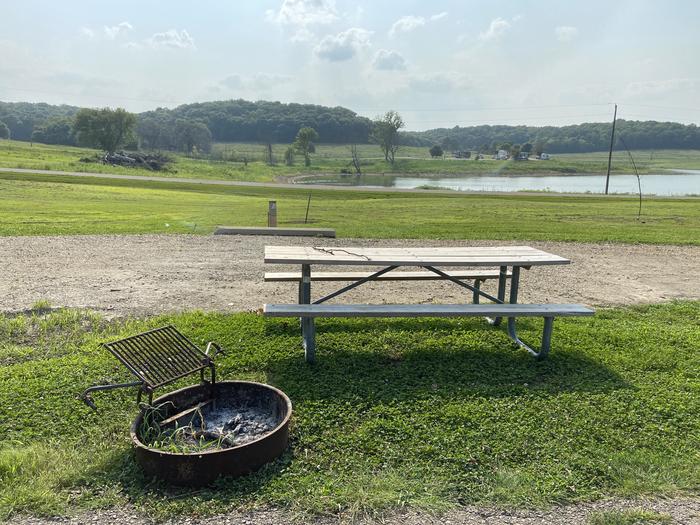 A photo of Site PB52 of Loop PENB at ROCK CREEK (KS) with Picnic Table, Electricity Hookup, Fire Pit, Water Hookup