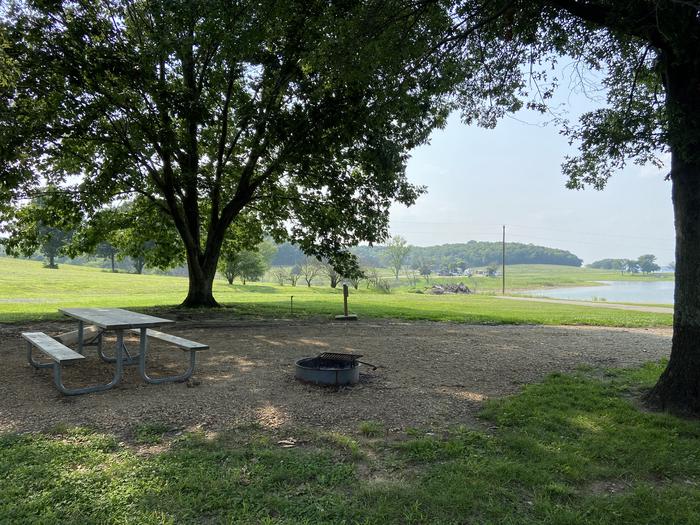 A photo of Site PB45 of Loop PENB at ROCK CREEK (KS) with Picnic Table, Electricity Hookup, Fire Pit, Shade, Water Hookup