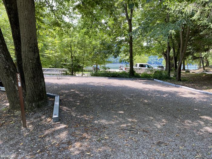 A photo of Site 021 of Loop MILL RUN RECREATION AREA at MILL RUN RECREATION AREA with Boat Ramp, Picnic Table, Fire Pit, Shade