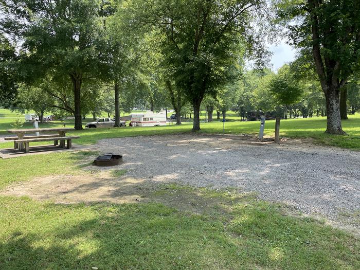 A photo of Site 041 of Loop LAKE at DEFEATED CREEK PARK with Picnic Table, Fire Pit, Shade, Full Hookup