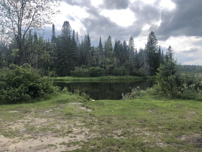 A photo of Site 004D of Loop Alcona Pond at AUSABLE RIVER CAMPING with Waterfront