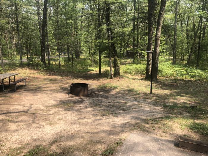 A photo of Site 12 of Loop ROUND LAKE at ROUND LAKE with Picnic Table, Fire Pit, Lantern Pole, near restroom 