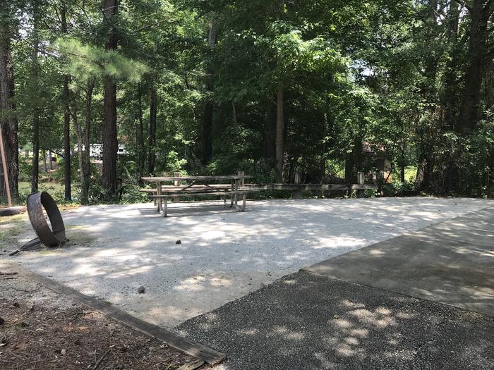 A photo of Site 069 of Loop LOOG at Holiday (Georgia) with Picnic Table, Electricity Hookup, Fire Pit, Shade, Waterfront, Lantern Pole, Water Hookup