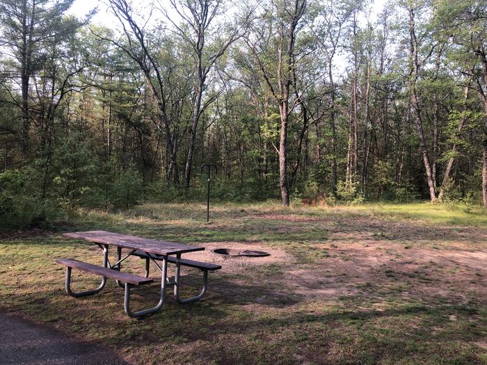 A photo of Site 007 of Loop ROLLWAYS CAMPGROUND at ROLLWAYS CAMPGROUND with Picnic Table, Fire Pit, Lantern Pole