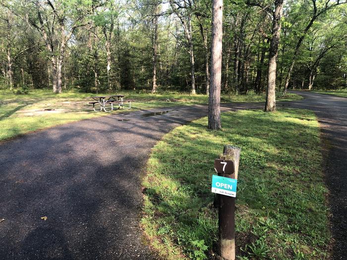 A photo of Site 007 of Loop ROLLWAYS CAMPGROUND at ROLLWAYS CAMPGROUND with Picnic Table, Fire Pit, Lantern Pole, pull through parking 