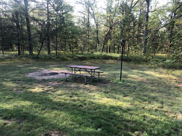 A photo of Site 011 of Loop ROLLWAYS CAMPGROUND at ROLLWAYS CAMPGROUND with Picnic Table, Fire Pit, Lantern Pole