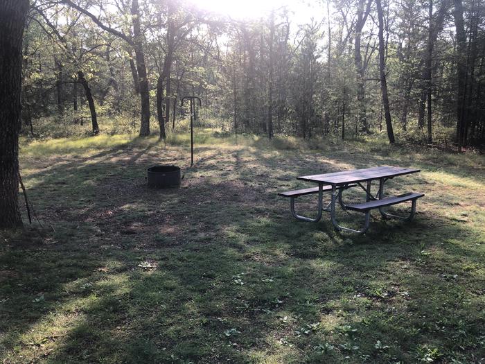 A photo of Site 013 of Loop ROLLWAYS CAMPGROUND at ROLLWAYS CAMPGROUND with Picnic Table, Fire Pit, Lantern Pole