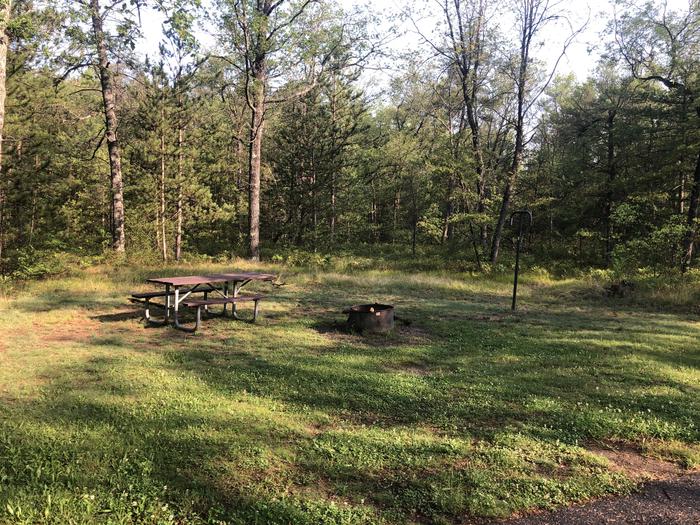 A photo of Site 012 of Loop ROLLWAYS CAMPGROUND at ROLLWAYS CAMPGROUND with Picnic Table, Fire Pit, Lantern Pole