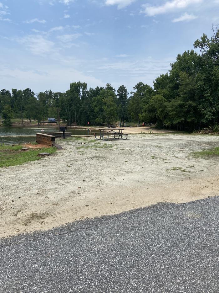A photo of Site 27 of Loop SPRINGFIELD  at SPRINGFIELD with Picnic Table, Electricity Hookup, Fire Pit, Tent Pad, Waterfront, Lantern Pole, Water Hookup