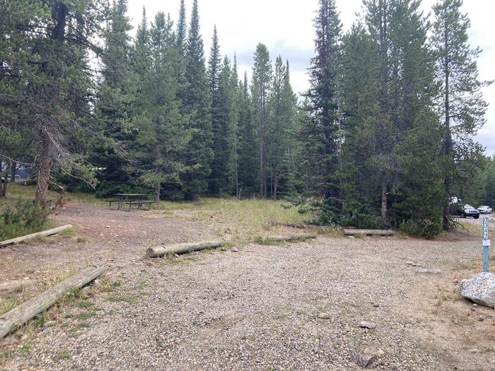 A photo of Site 342 of Loop O at Colter Bay Campground with Picnic Table, Fire Pit, Food Storage