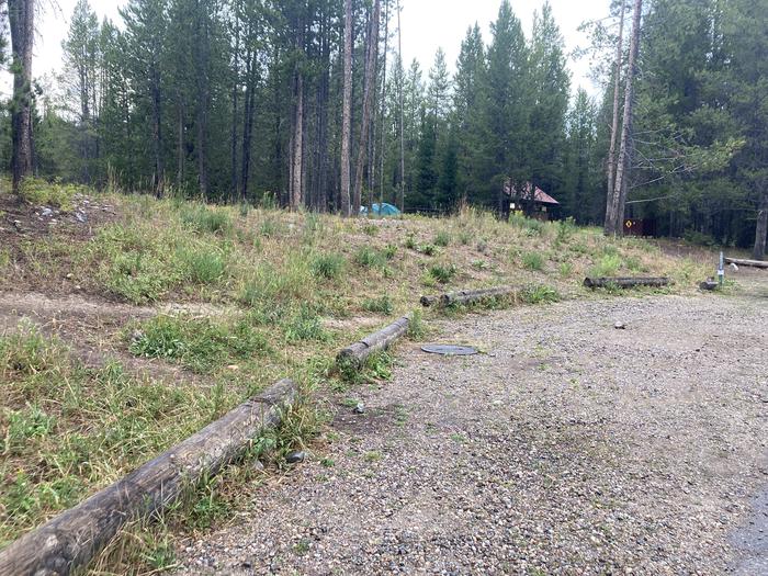 A photo of Site 281 of Loop M at Colter Bay Campground with Picnic Table, Fire Pit, Food Storage