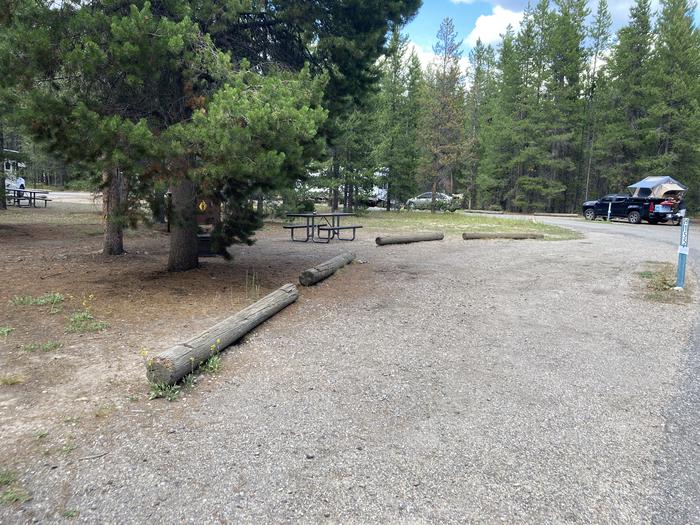 A photo of Site 155 of Loop H at Colter Bay Campground with Picnic Table, Fire Pit, Food Storage