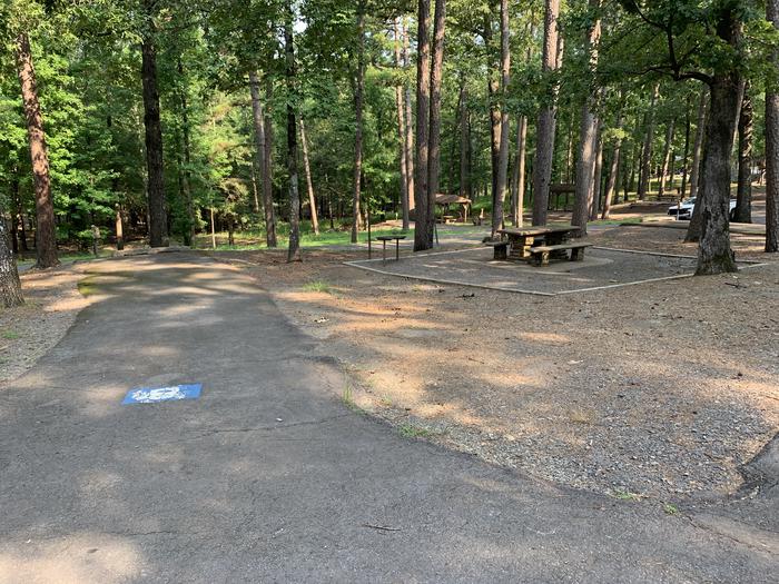 A photo of Site 08 of Loop QCOV at QUARRY COVE with Picnic Table, Electricity Hookup, Fire Pit, Shade, Lantern Pole, Water Hookup