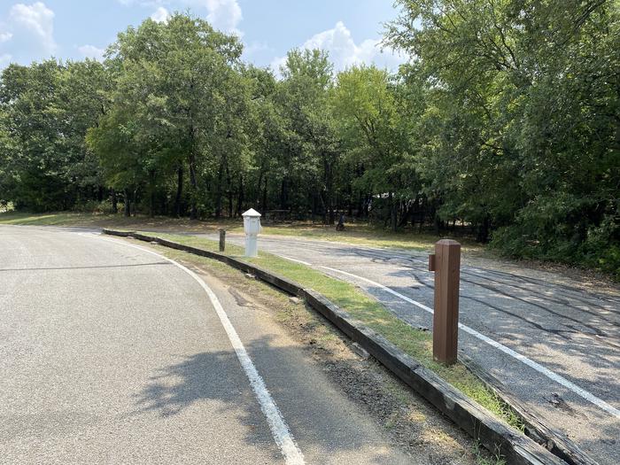 A photo of Site 094 of Loop HICKORY CREEK  at HICKORY CREEK with Boat Ramp, Picnic Table, Electricity Hookup, Fire Pit, Shade, Lantern Pole, Water Hookup