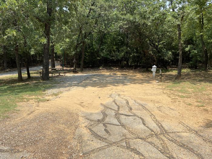 A photo of Site 037 of Loop HICKORY CREEK  at HICKORY CREEK with Boat Ramp, Picnic Table, Electricity Hookup, Fire Pit, Shade, Lantern Pole, Water Hookup
