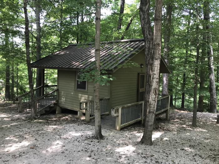 A photo of Site CA1 of Loop CABI at HARDIN RIDGE with Picnic Table, Electricity Hookup, Fire Pit, Shade, Men’s and women’s vault toilet in between the two cabins and a water spigotA nice secluded cabin on the lake with the boat toilets for men and women and water spigot
