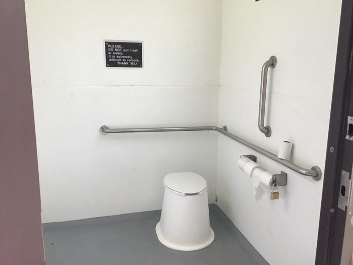 Accessible vault toilet within Sedalia Campground
