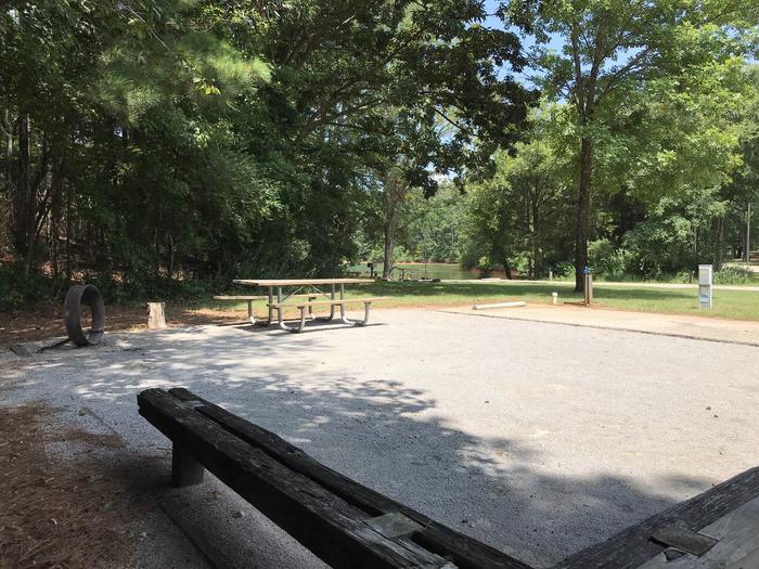 A photo of Site 104 of Loop LOOJ at Holiday (Georgia) with Picnic Table, Electricity Hookup, Fire Pit, Tent Pad, Lantern Pole, Water Hookup