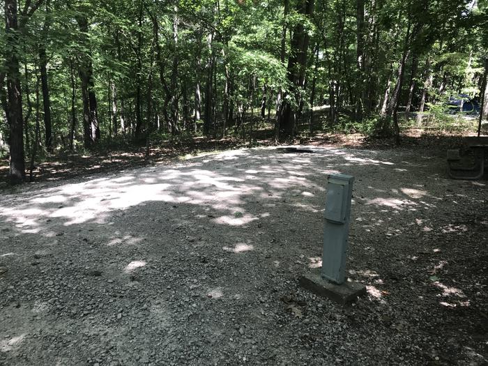 A photo of Site 172 of Loop PINE at HARDIN RIDGE with Picnic Table, Electricity Hookup, Fire Pit, Shade, Tent Pad, Lantern Pole