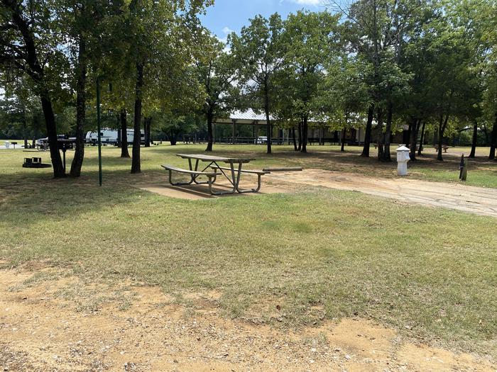A photo of Site 114 of Loop HICKORY CREEK at HICKORY CREEK with Boat Ramp, Picnic Table, Electricity Hookup, Fire Pit, Lantern Pole, Water Hookup