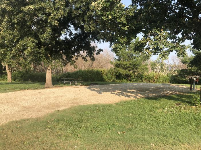 A photo of Site A-011 of Loop A at WEST ROLLING HILLS with Picnic Table, Electricity Hookup, Fire Pit, Shade, Water Hookup