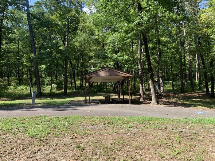 A photo of Site 004 of Loop RROA at RIVER ROAD with Picnic Table, Electricity Hookup, Fire Pit, Shade, Water Hookup