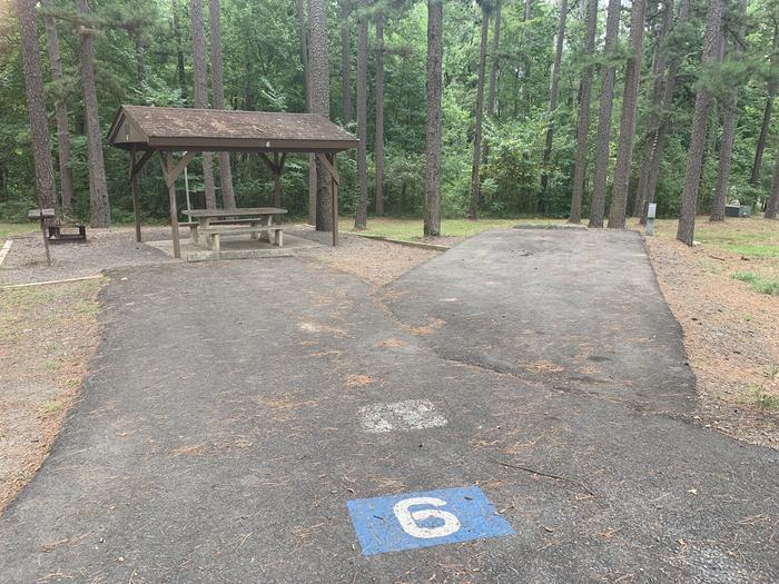A photo of Site 06 of Loop CARTER COVE  at CARTER COVE with Picnic Table, Electricity Hookup, Fire Pit, Shade, Lantern Pole